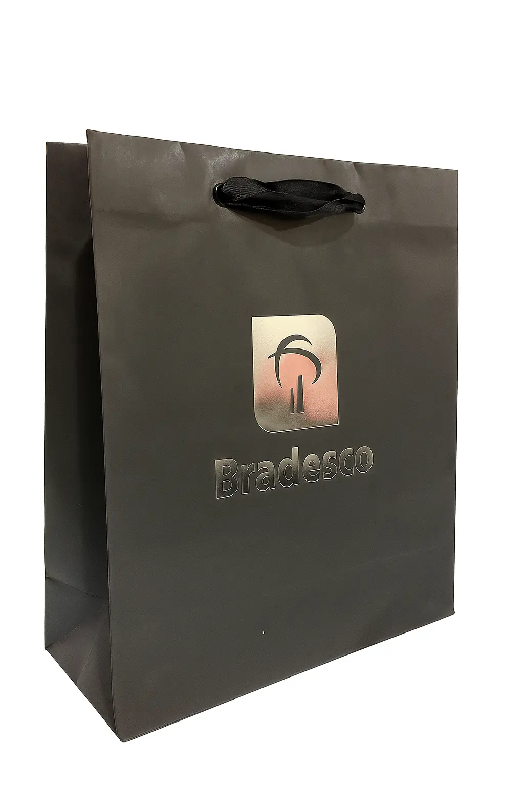 Detalhe de alça de gorgurão em sacola de papel